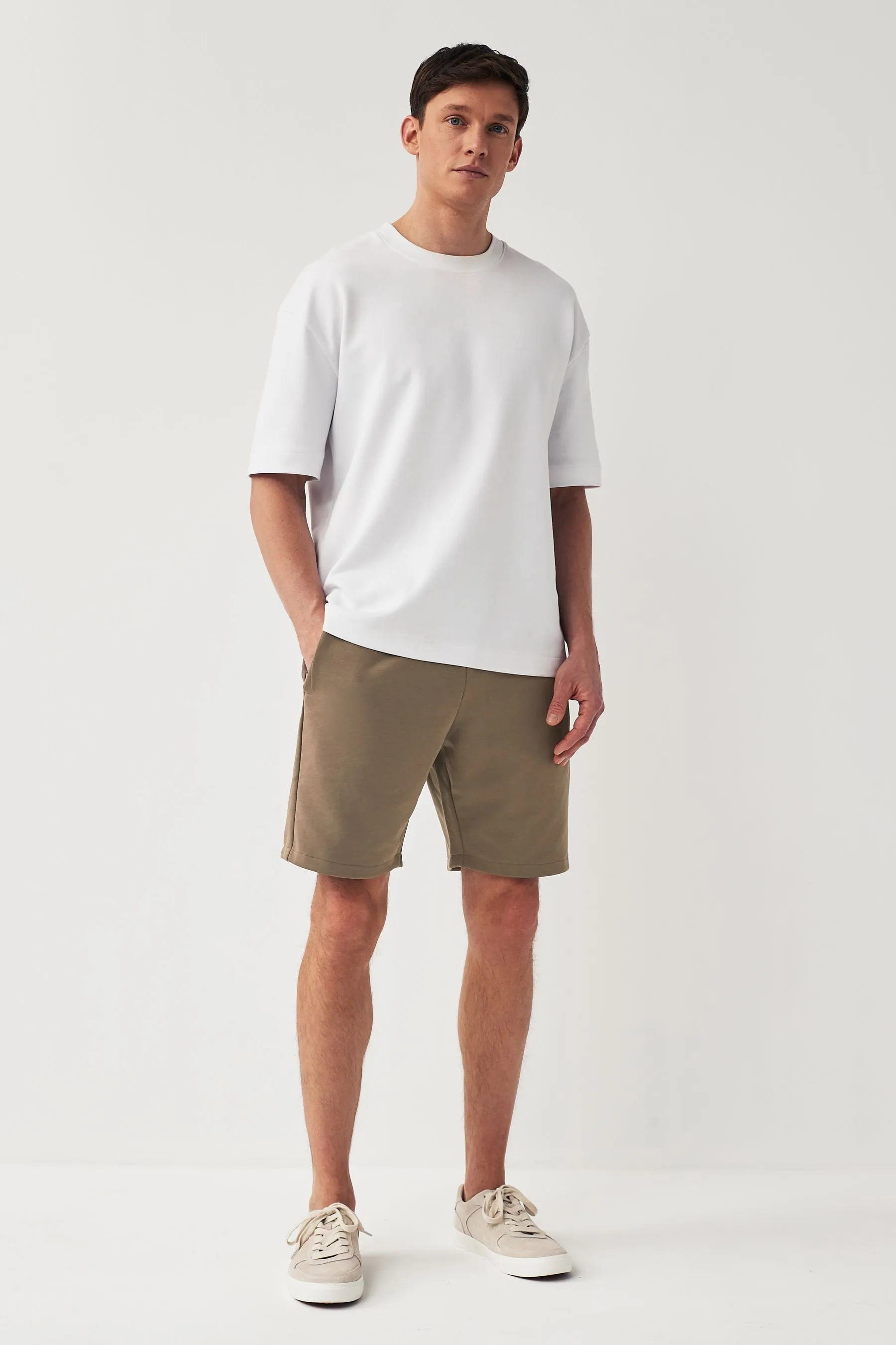 Shorts in jersey con tasche con zip