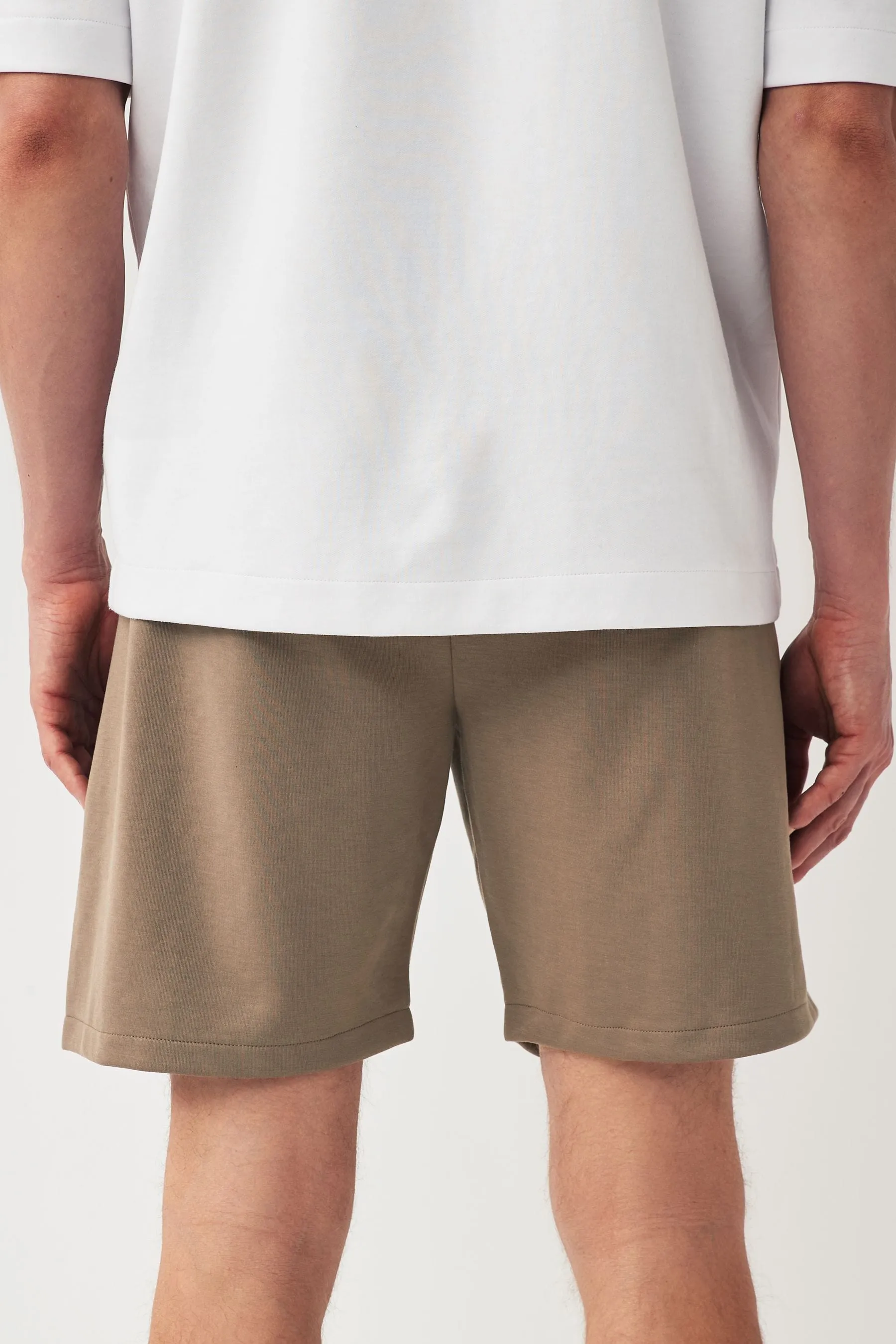 Shorts in jersey con tasche con zip