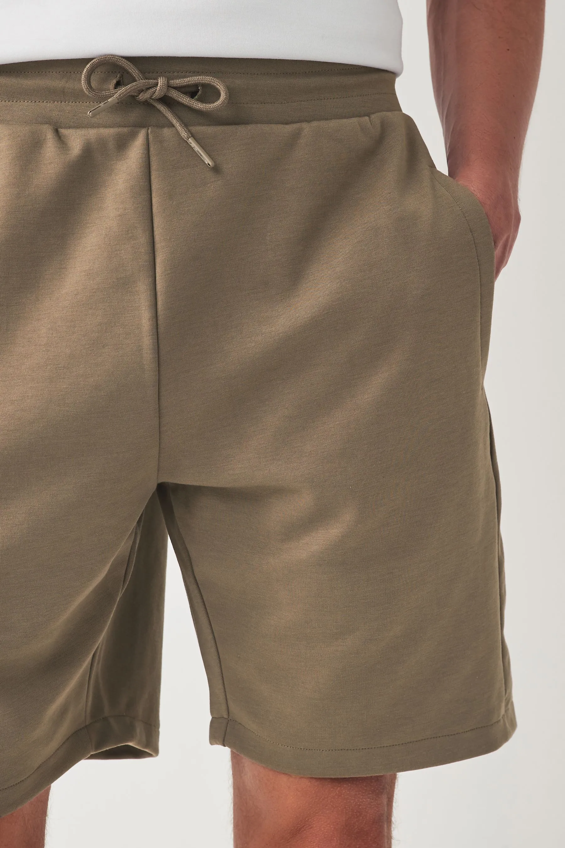 Shorts in jersey con tasche con zip